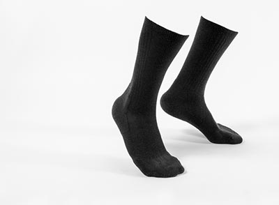 <span>Outlier Megafine Merino Socks</span><i>→</i>